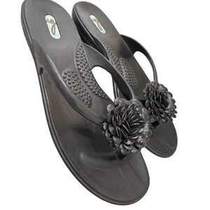 Oka-B Vivie model large flower accent and a molded footbed with massage beads L